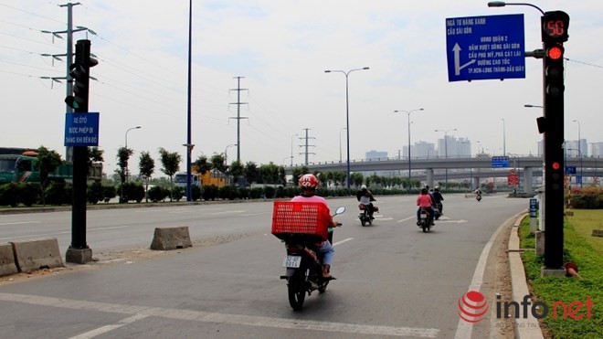 Nguoi Sai Gon co vuot den do, lan lan, bang ngang duong?-Hinh-11